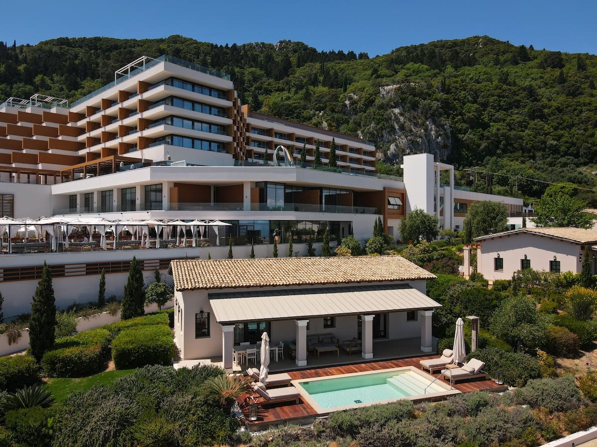 villa with pool surrounded by gardens in corfu greece